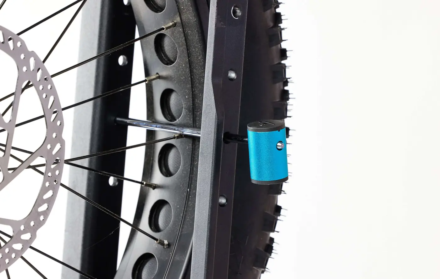 QuietKat Pivot Pro Vehicle Hitch Rack Wheel Lock — hero
